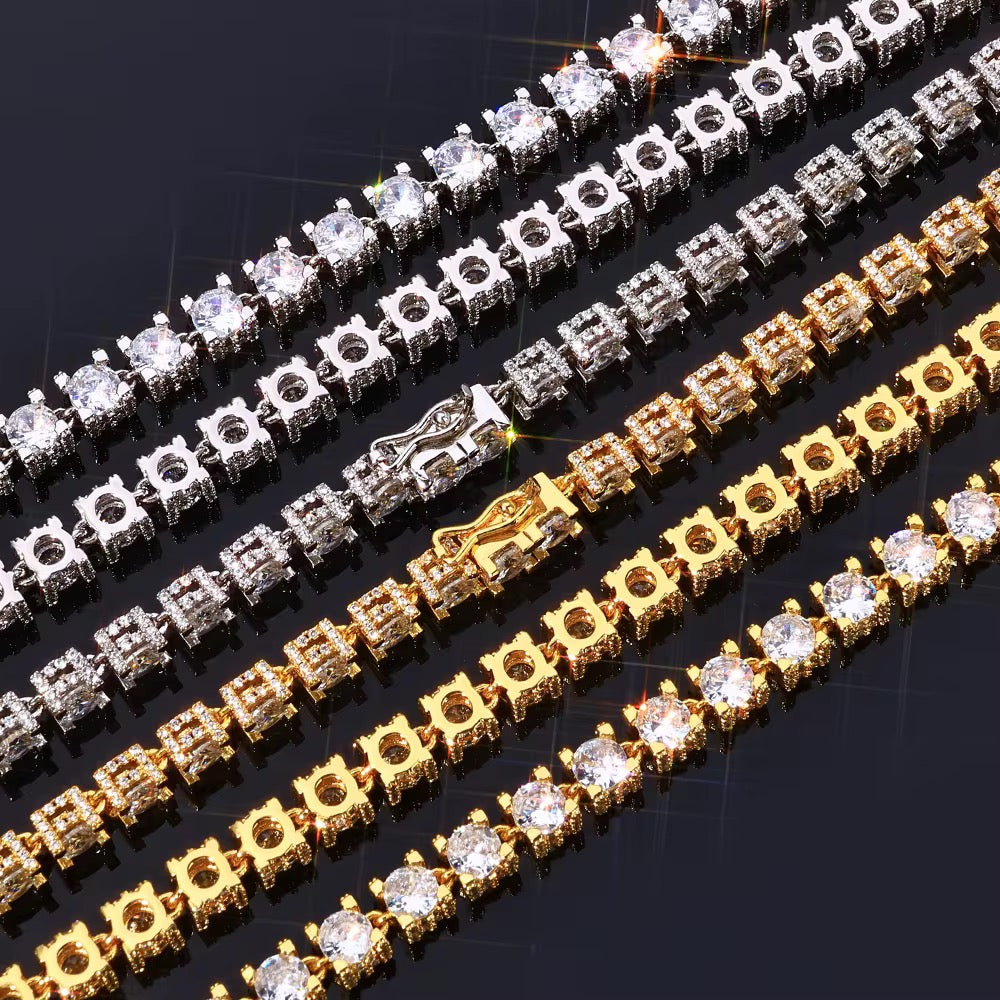 Diamond-encrusted bracelets, gold and silver, on a dark background.