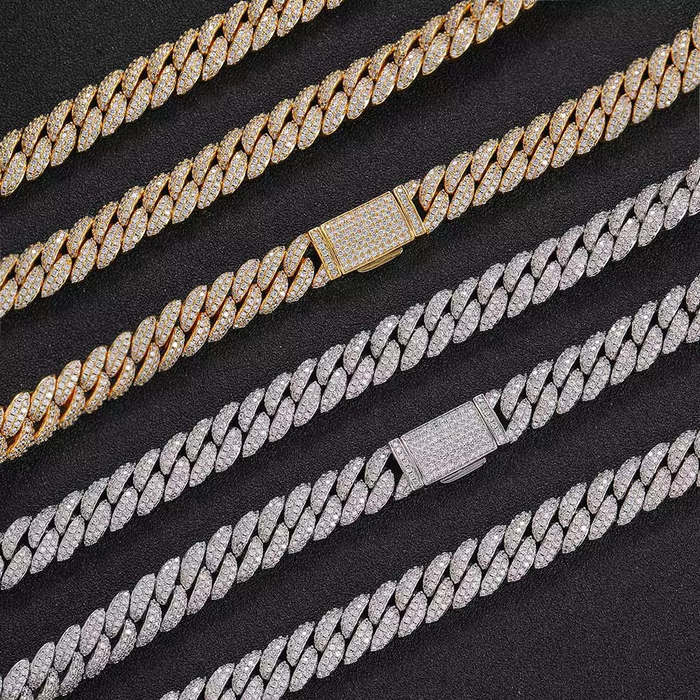 Gold and silver chain necklaces on a black background


