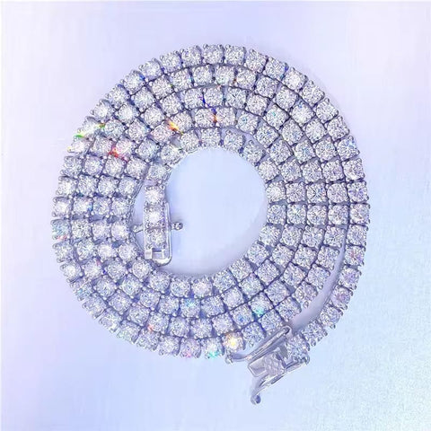 Diamond-encrusted bracelet on a light purple background


