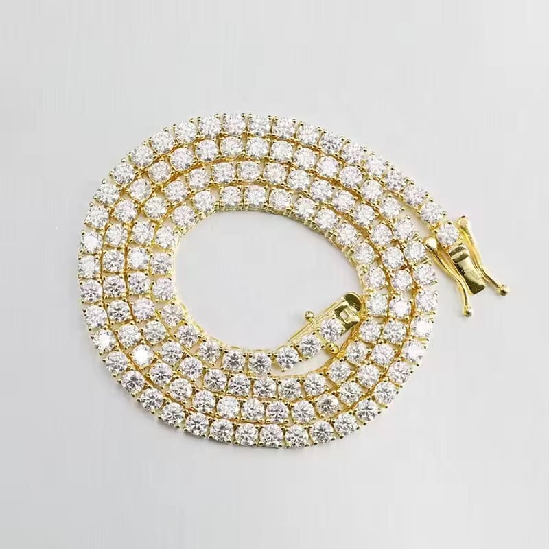 Gold and diamond bracelet on a light gray background

